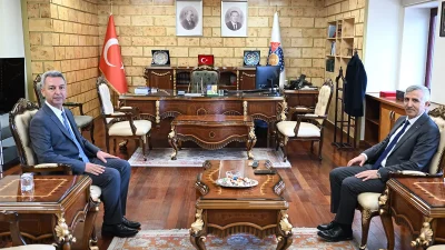 Vali Ünlüer, Prof. Dr. İbrahim Taner Okumuş’a yeni görevinde başarılar