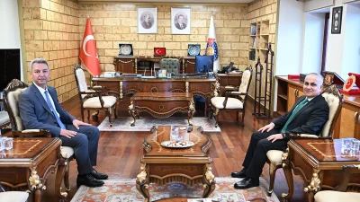 Rektör Doğan, Prof. Dr. İbrahim Taner Okumuş’a yeni görevinde başarılar